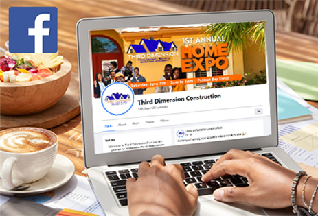 Hand on laptop viewing Third Dimension Facebook page